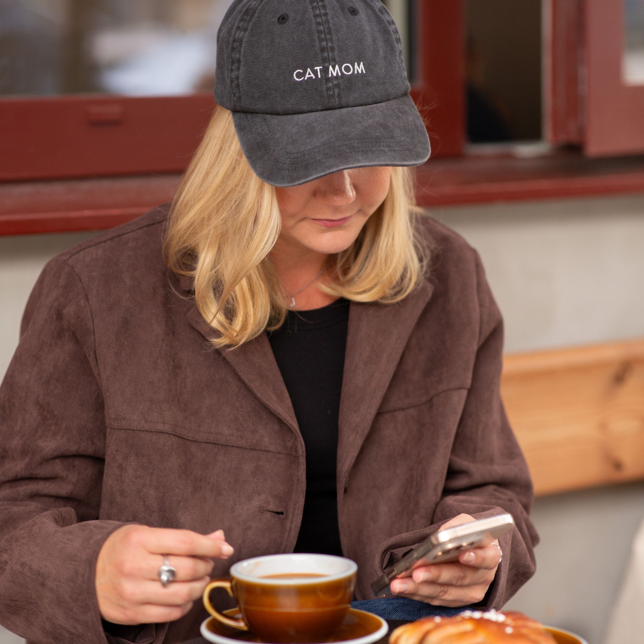 black-denim-cap-cat-mom-woman-coffee.jpg