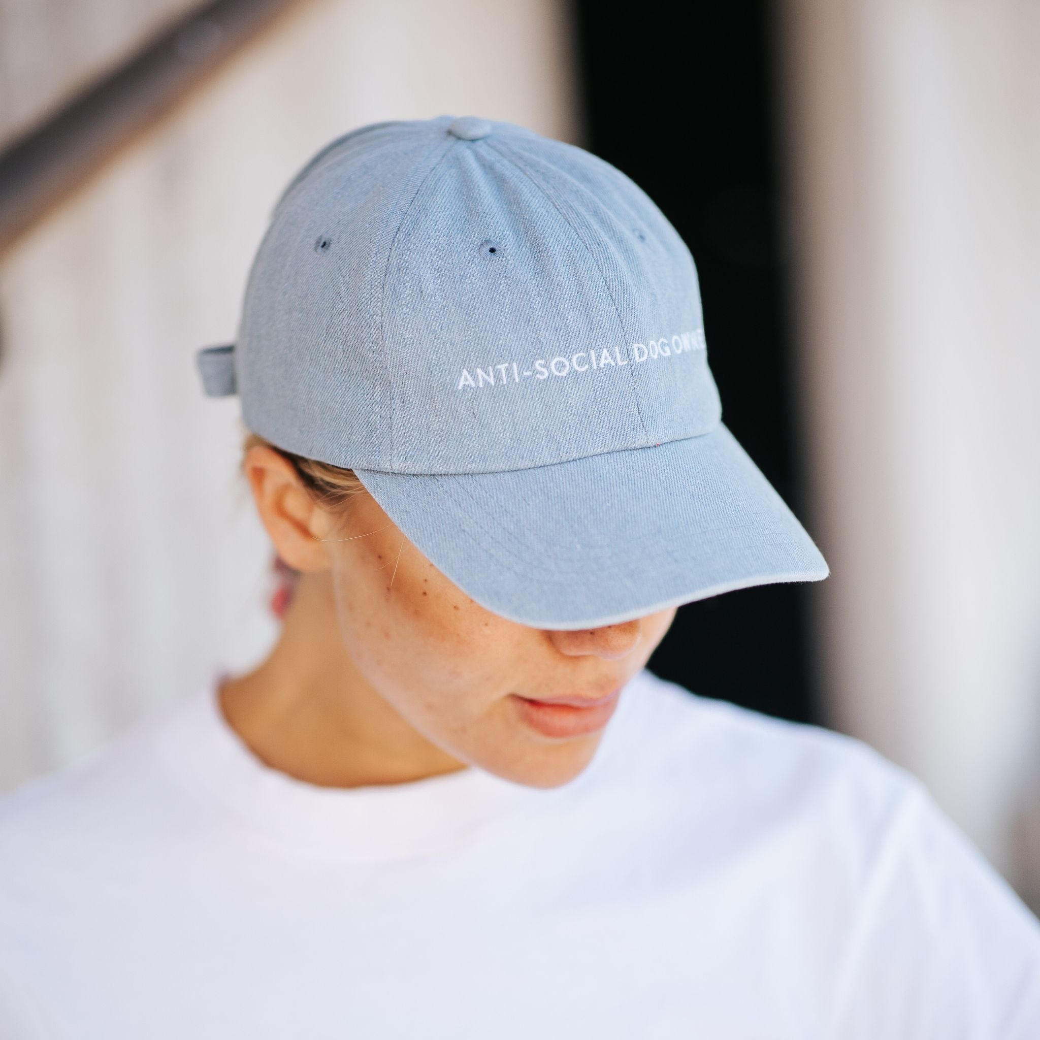 denim-cap-anti-social-dog-owner-wearing-on-women.jpg