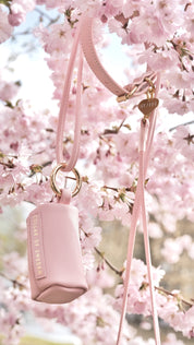 Porta bolsas de caca rosa