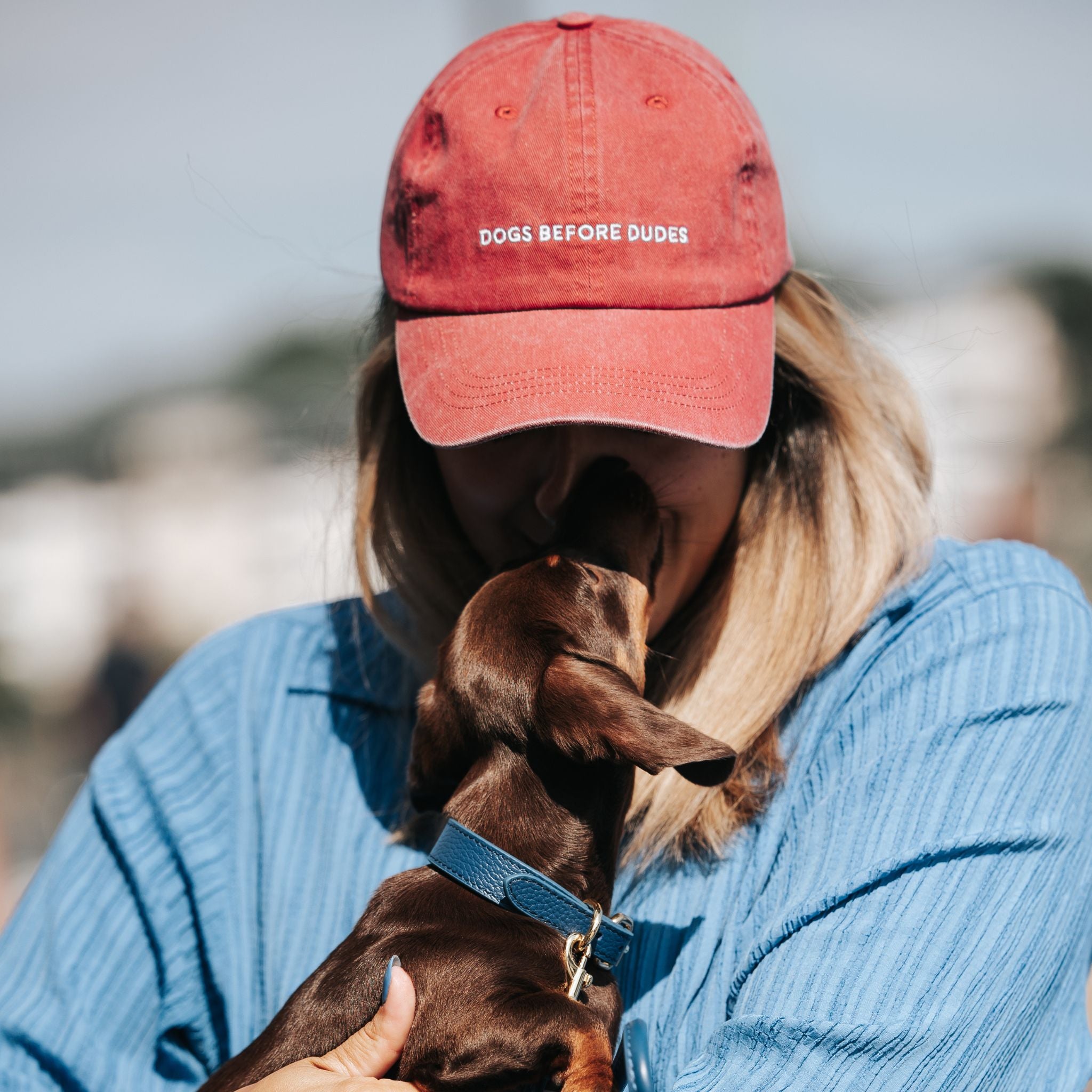 red-denim-cap-dogs-before-dudes-human-and-dachshund.jpg