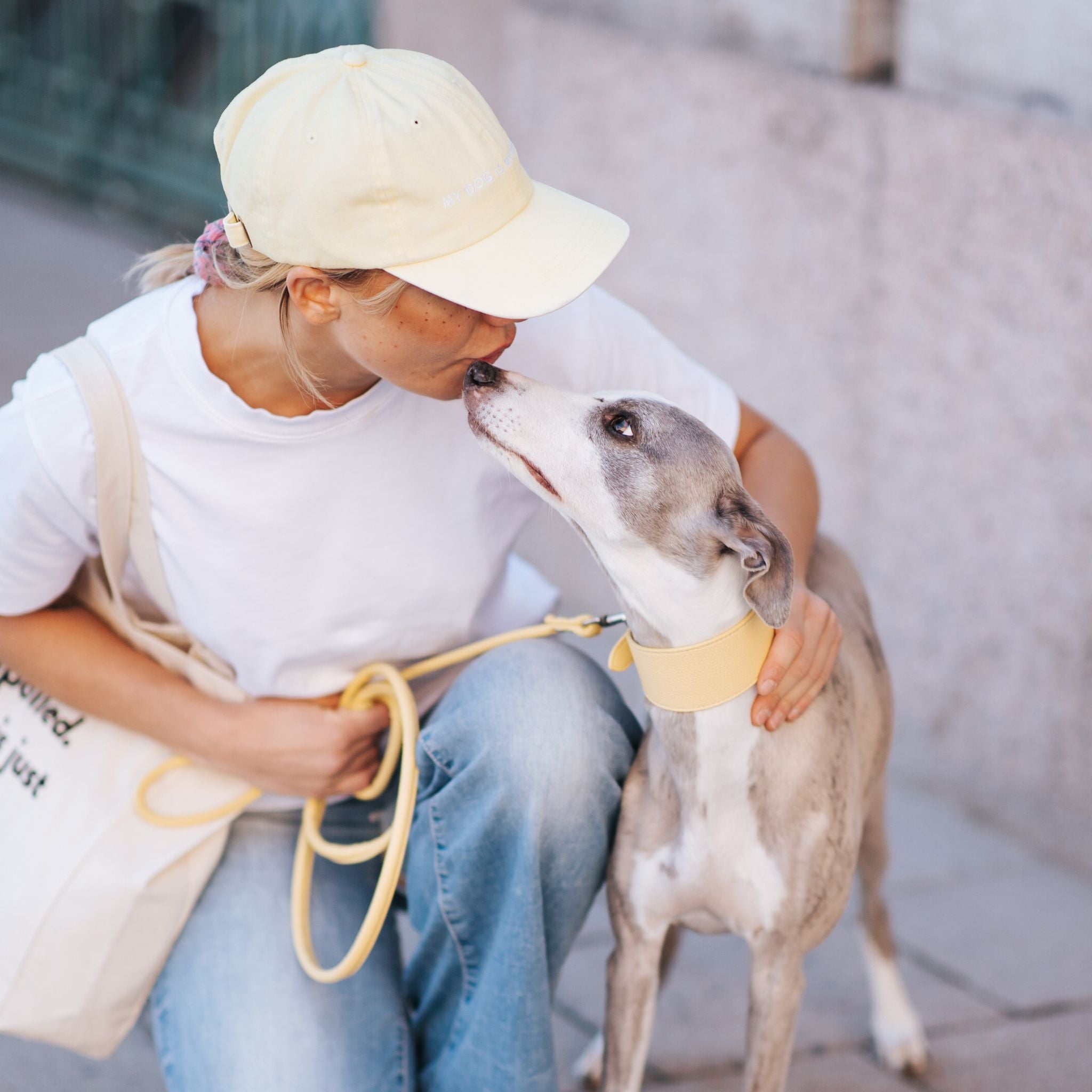 yellow-denim-cap-my-dog-is-my-shrink-wearing-on-woman.jpg